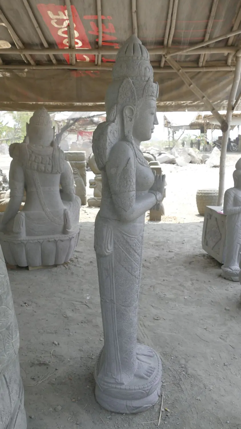  Product image 5 of the product “Standing Sri Dewi. Made from riverstone. Height 180cm ”